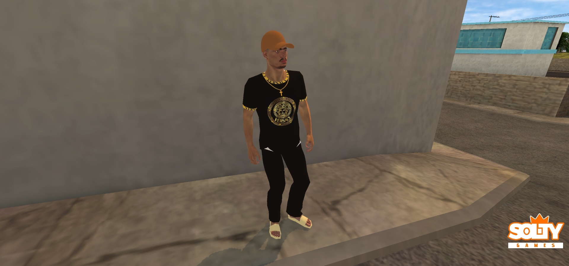 Skin – Traje Versace